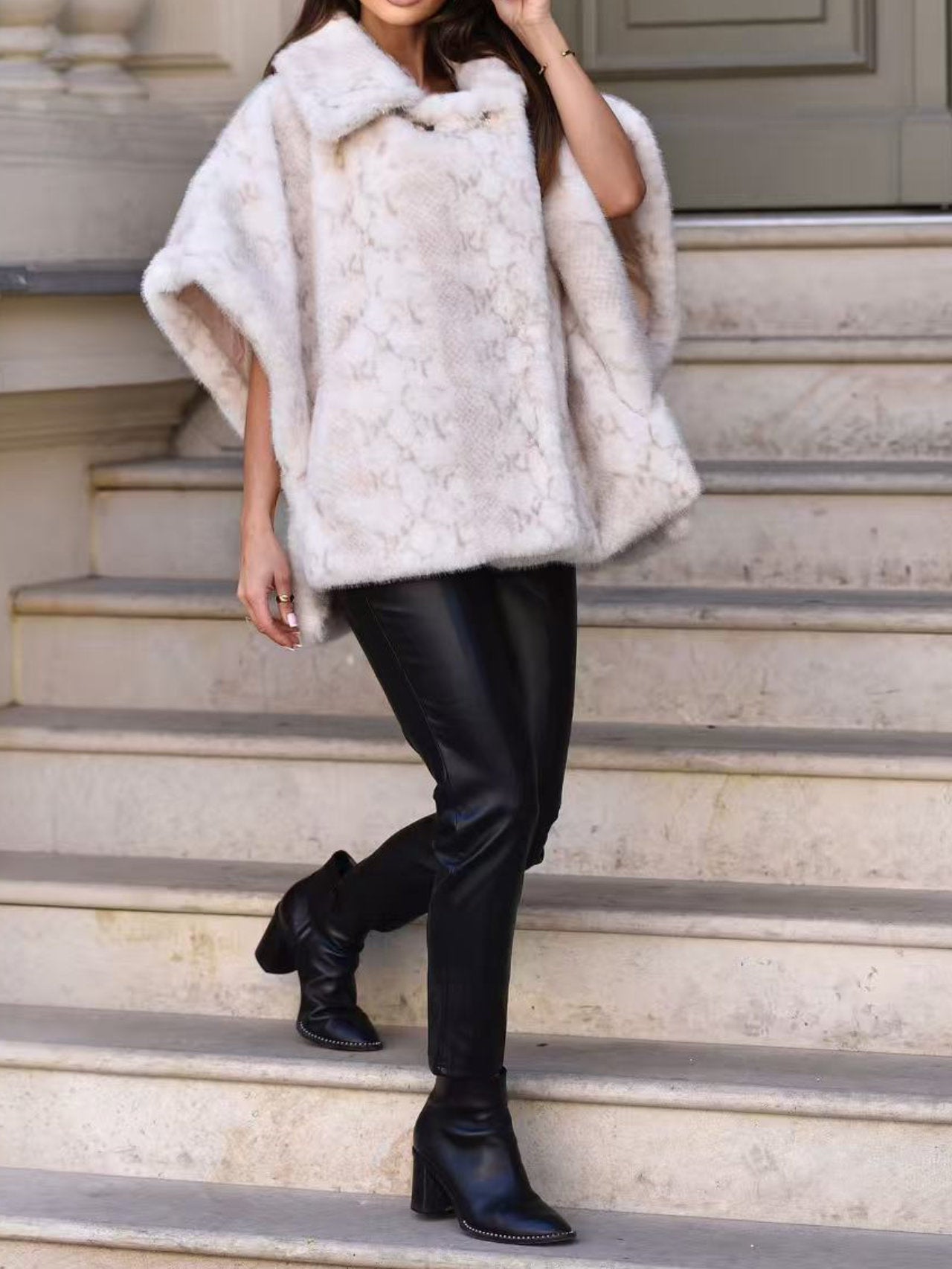 Poncho di pelliccia