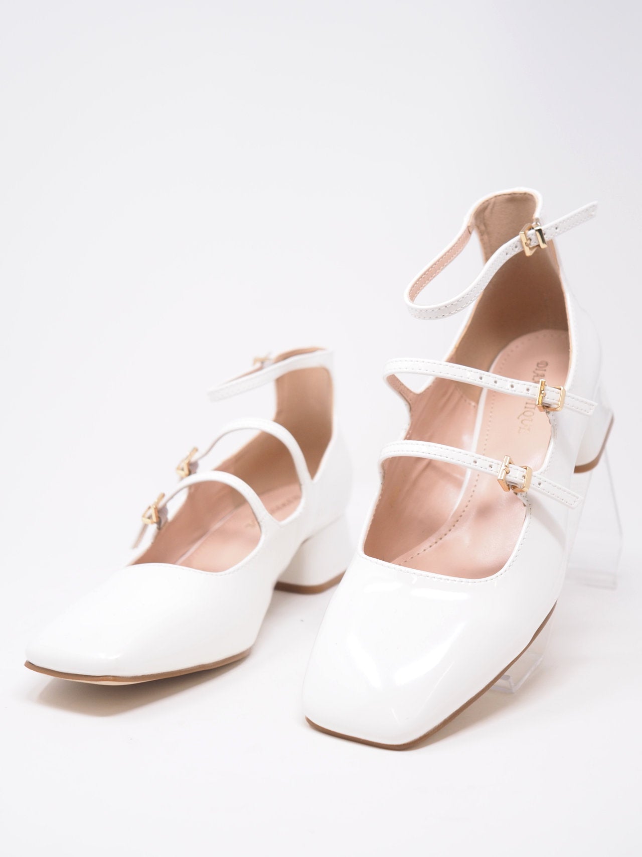 Décolleté con cinturini