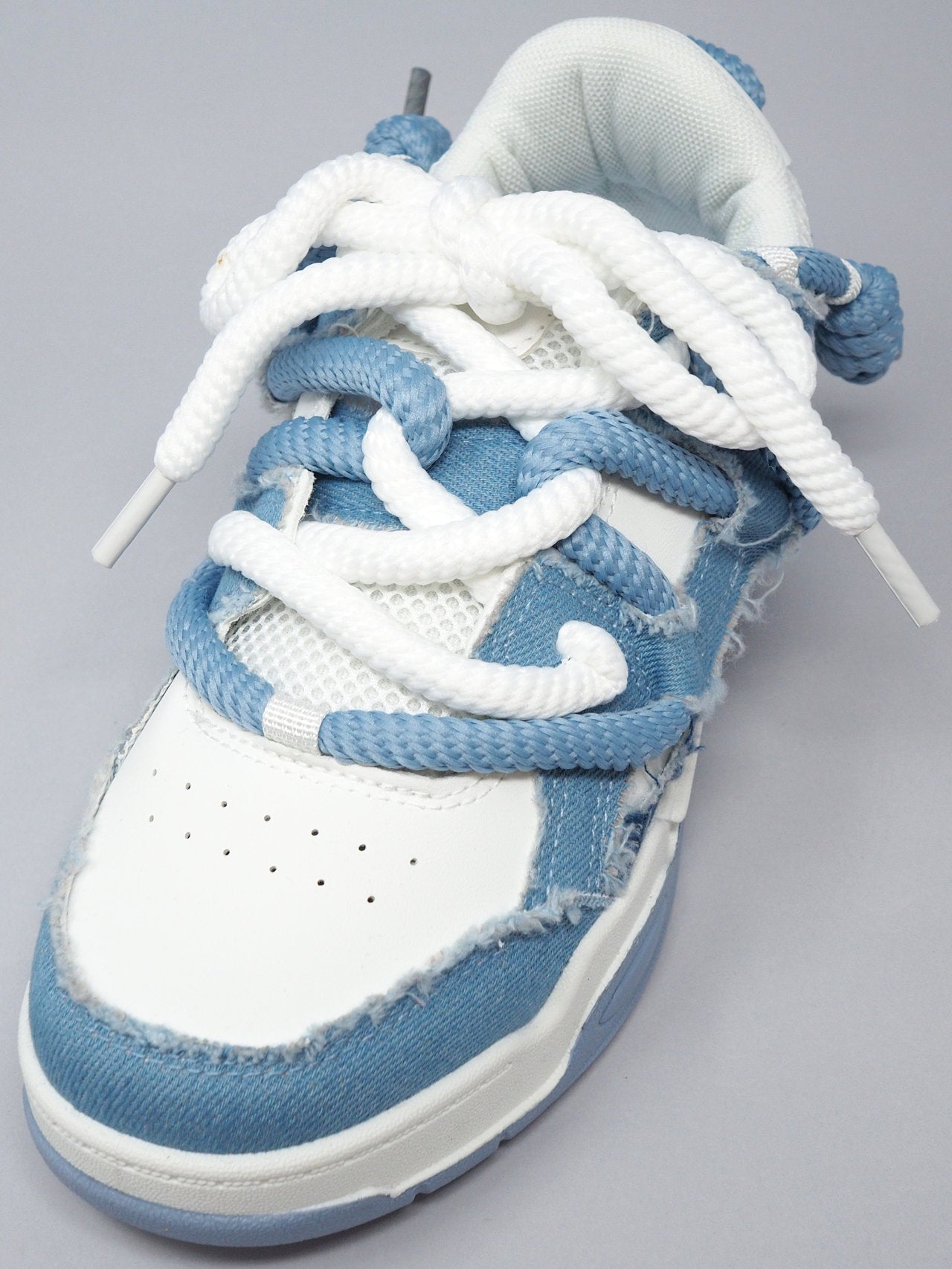 Sneakers con lacci grossi
