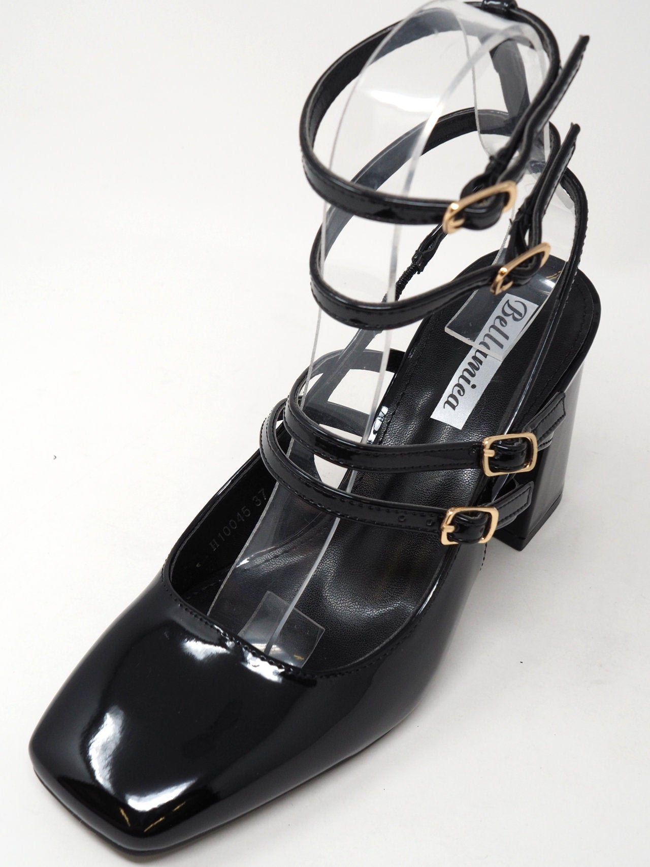 Décolleté lucide con cinturini