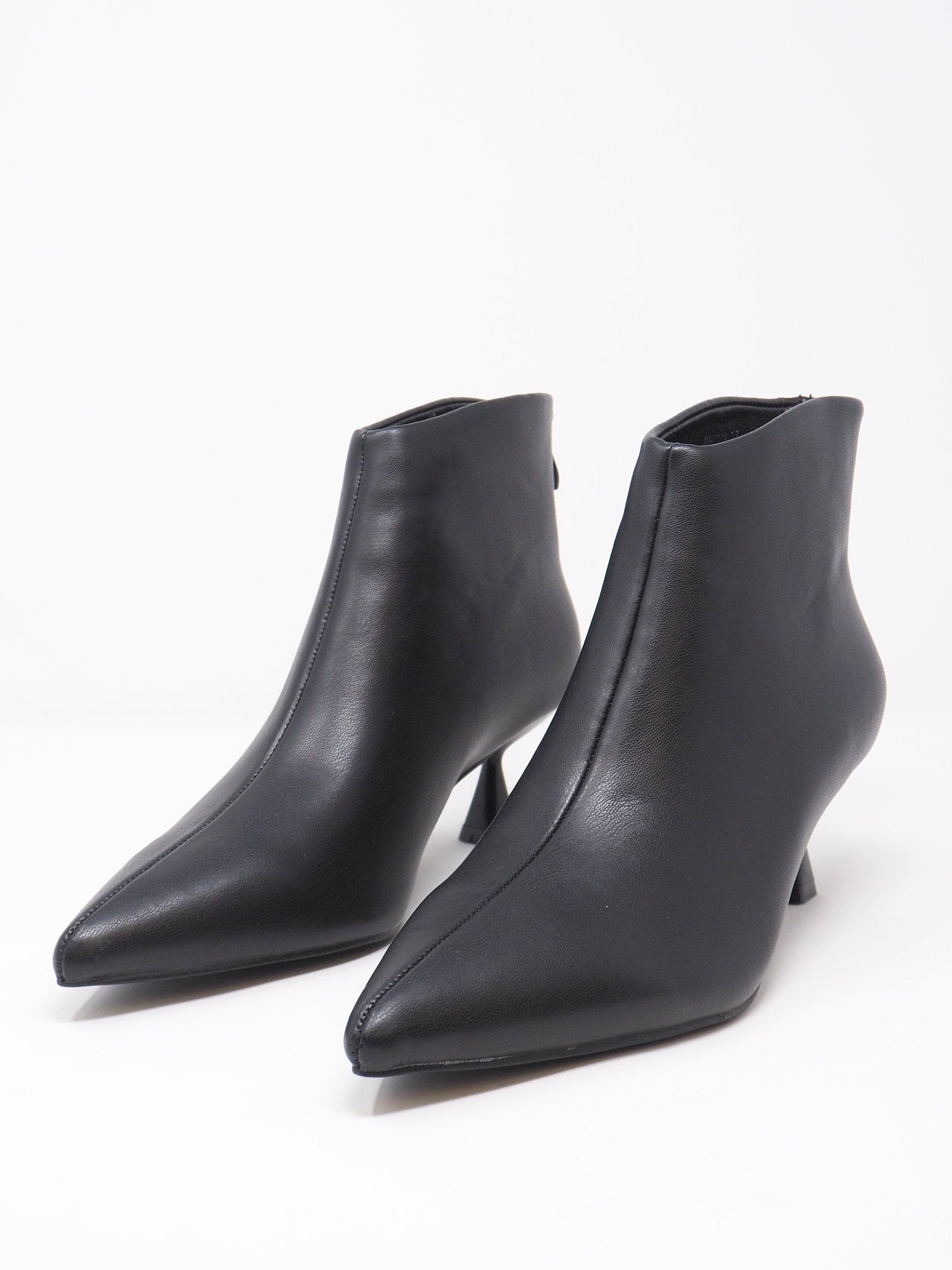 Tronchetti a punta con cerniera dietro