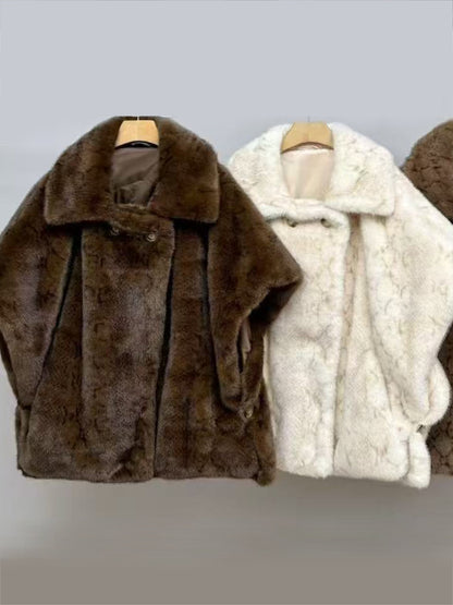 Poncho di pelliccia