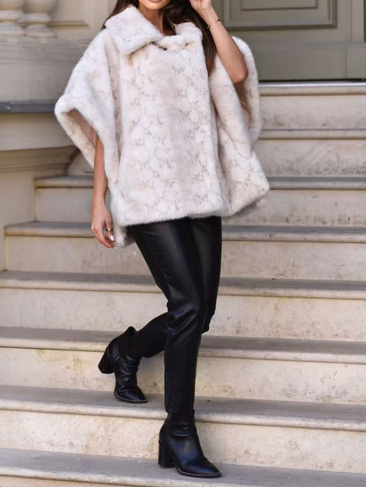 Poncho di pelliccia