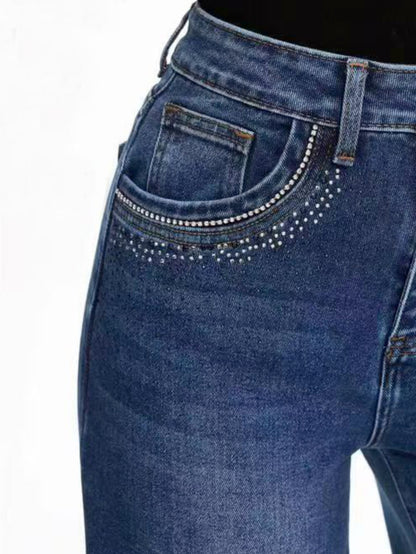Jeans con strass sulle tasche