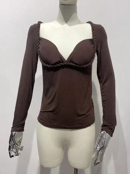 Maglia con corda arrotolata