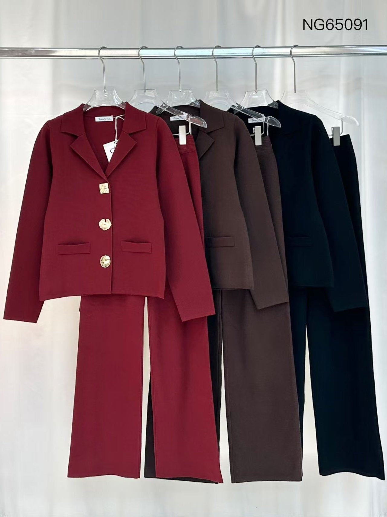 Completo giacca e pantaloni in maglia