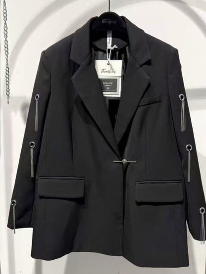 Blazer con borchie ad anelle
