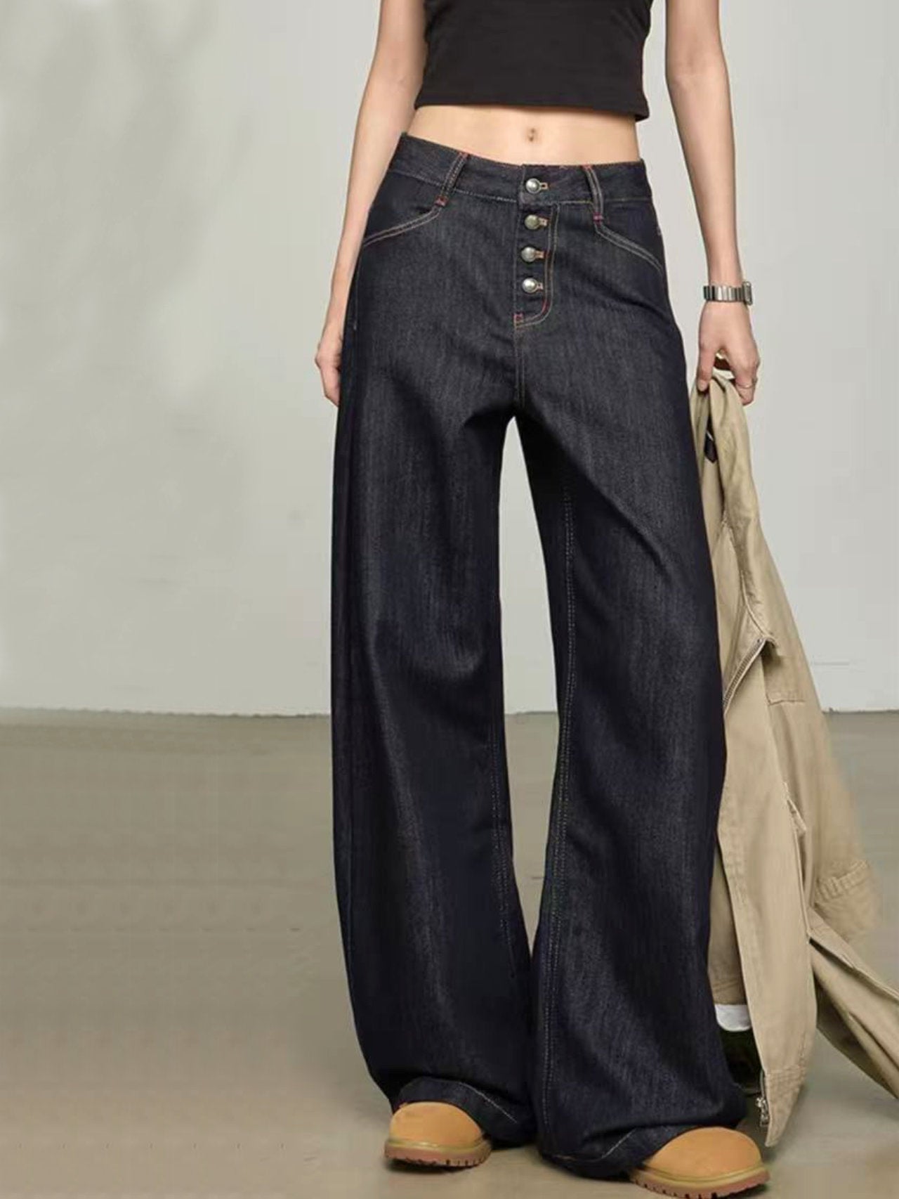 Jeans a palazzo con bottoni a vista