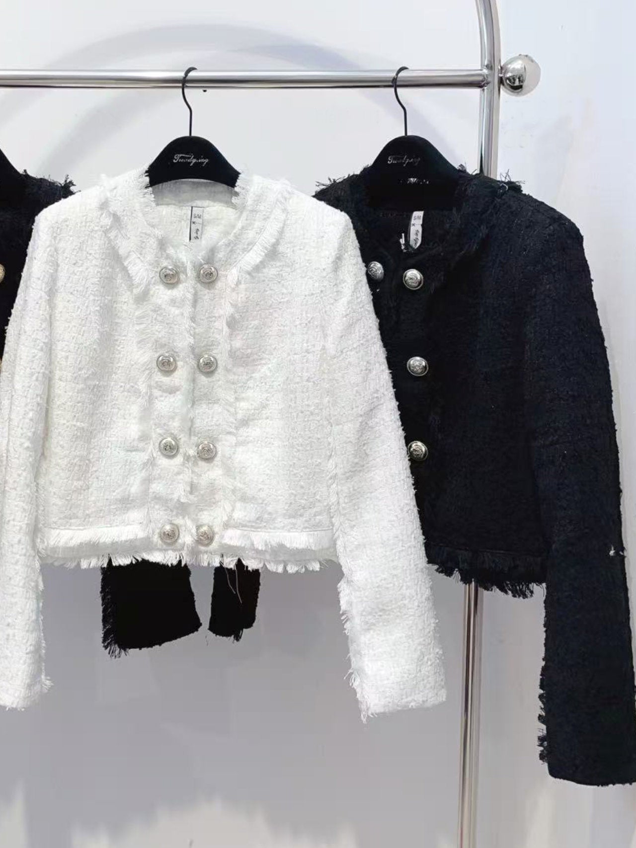 Giacca tweed con bottoni ornamentali